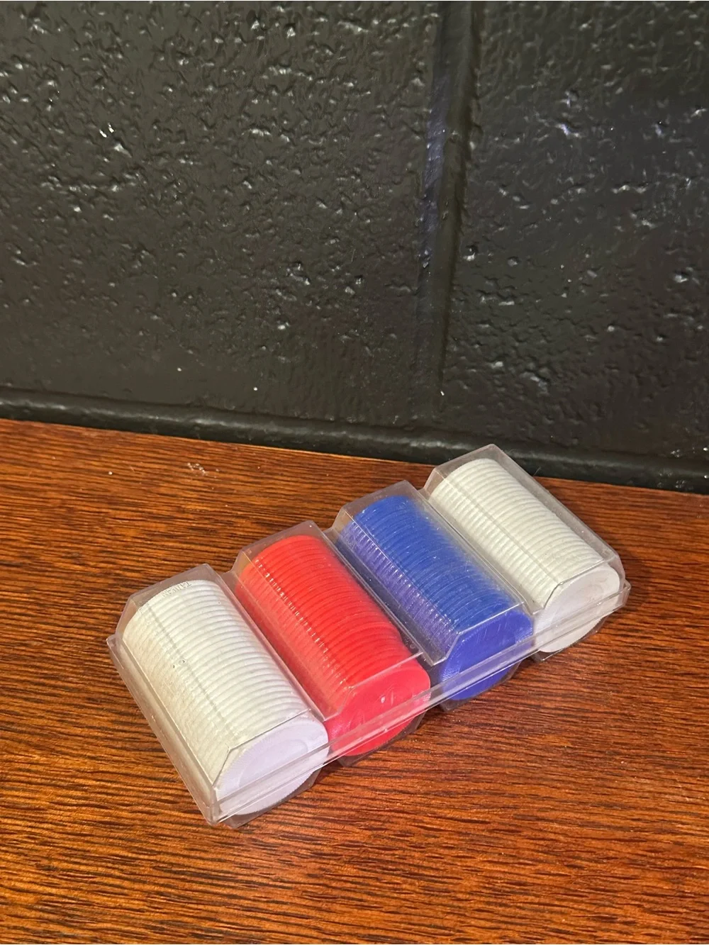 Red, Blue and White Poker Chips in Clear Case